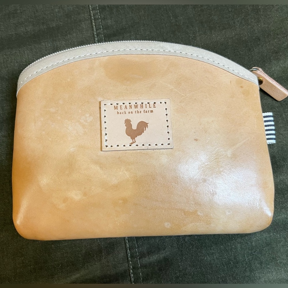 Meanwhile back on the farm leather makeup clutch
